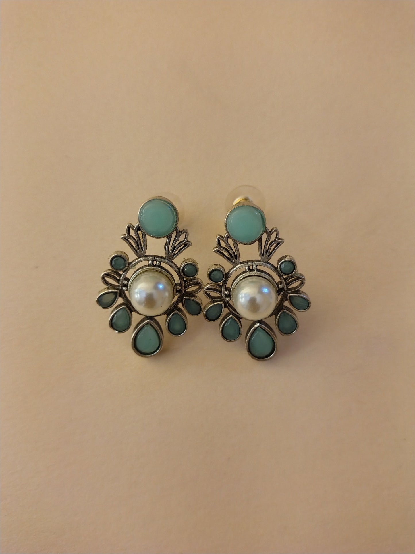 Elegant Ruby-Tone Stud Earrings with Central Pearl Accent