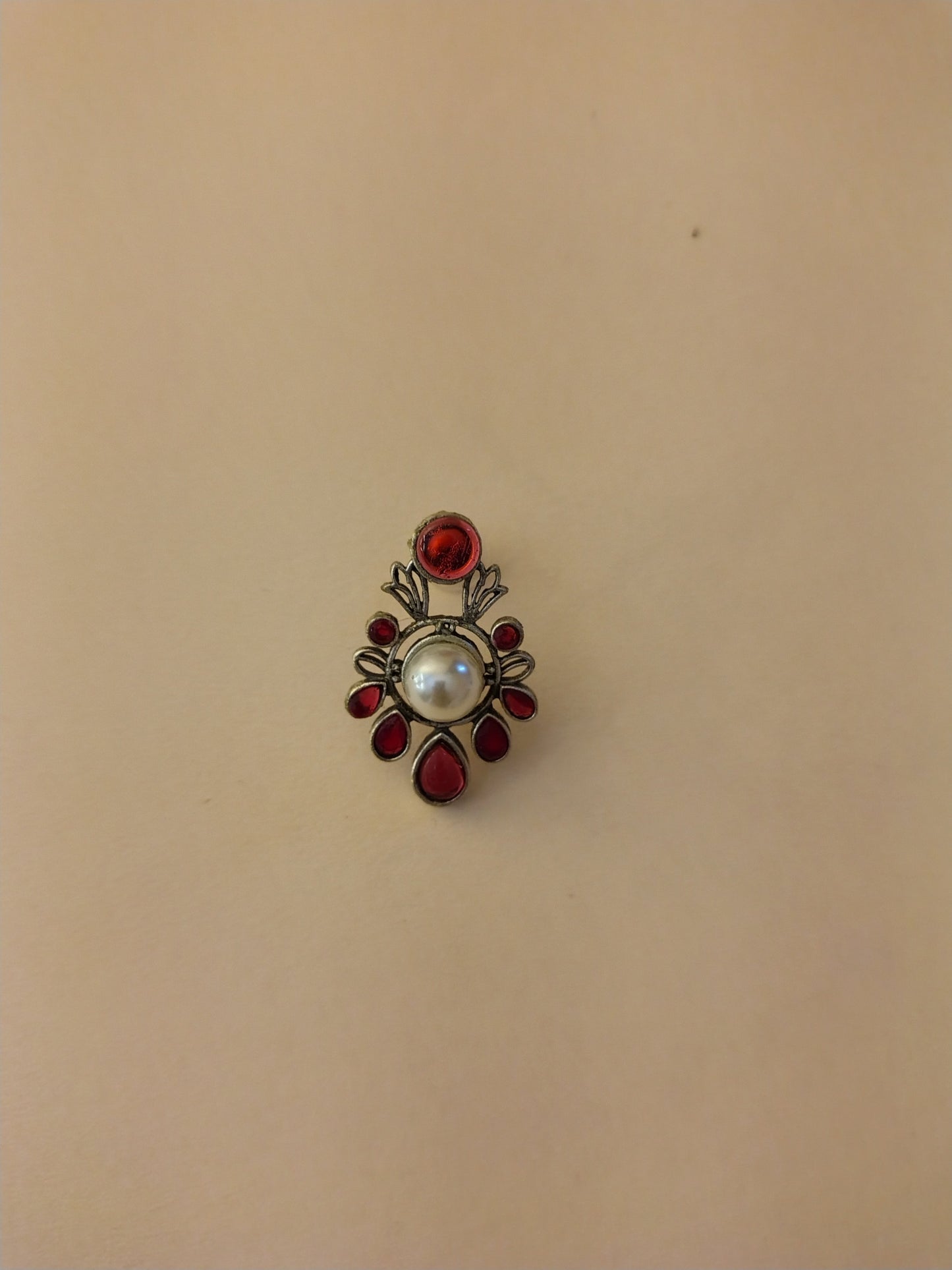 Elegant Ruby-Tone Stud Earrings with Central Pearl Accent